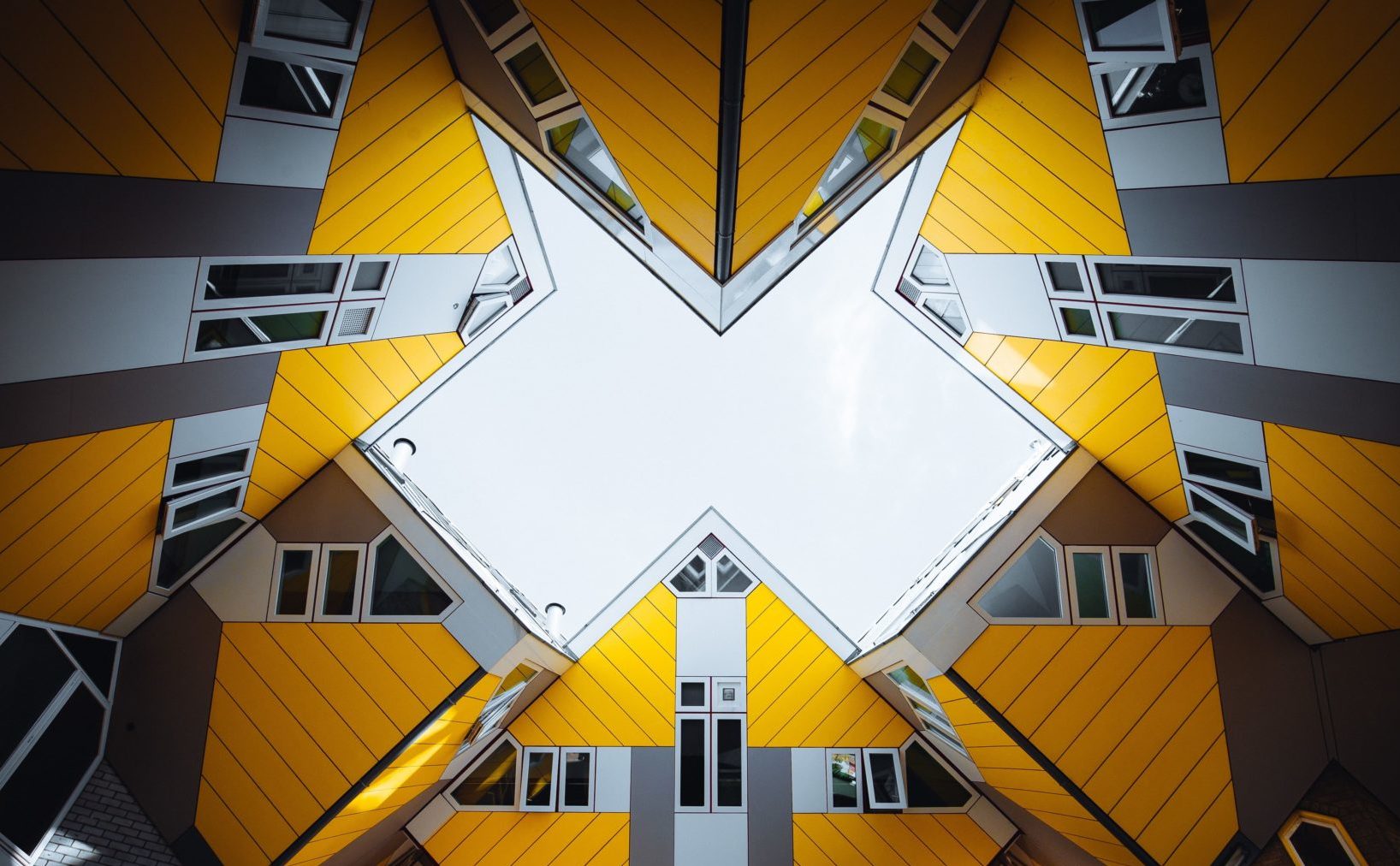 A geometric collage of houses, photographed from a low angle